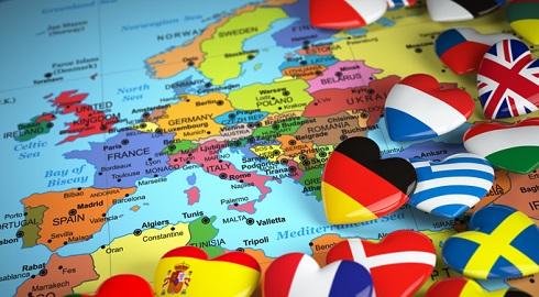 Travel EU concept. Map of Europe and hearts with flags of european countries.  3d